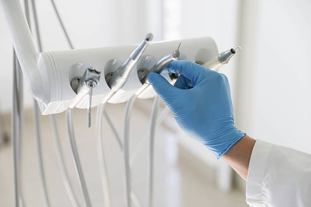 Professional Tooth Extraction technician working in Highland Village, TX